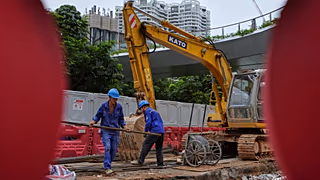 Workers at a construction site at the Shenzhen Bay commercial district, in Shenzhen, China's Guangdong province. 19 Sept. 2025.